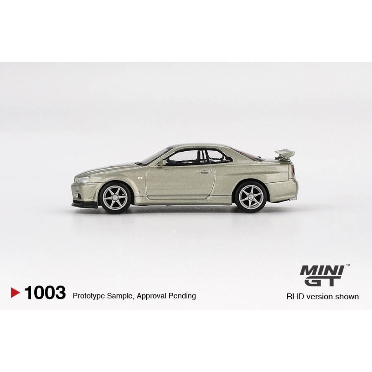 Mini GT 1/64 Nissan Skyline GT-R (R34) V-Spec II Nür Millenium Jade - Blister Paket MGT01003-BL - Thumbnail