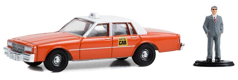 Greenlight 1/64 The Hobby Shop Series 15- 1981 Chevrolet Impala Capitol Cab Taxi with Man in Suit 97150-B - Thumbnail